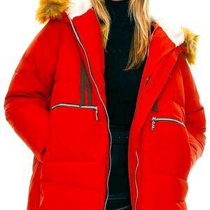 Orolay jacket with removable fur hood. This is a women’s small.